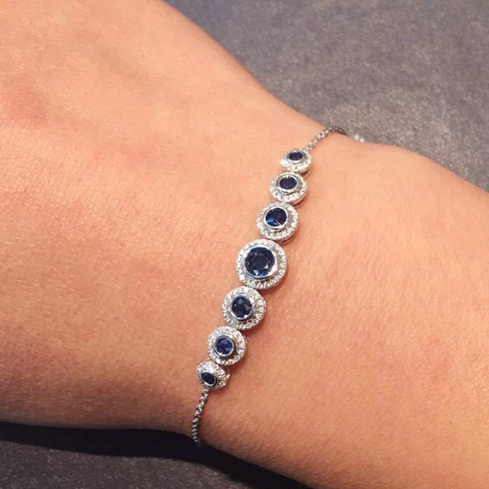Adeline Ruby Necklace and Sapphire Bracelet with Halo Diamond Setting in 18k White Gold - Kura Jewellery