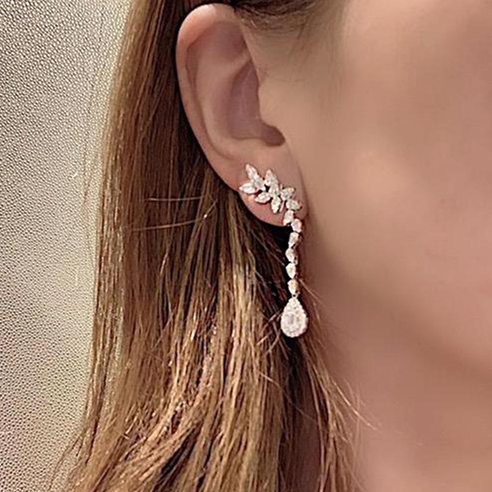 Shop Claire Semi-Cuff Long Diamond Earrings set in 18K White Gold