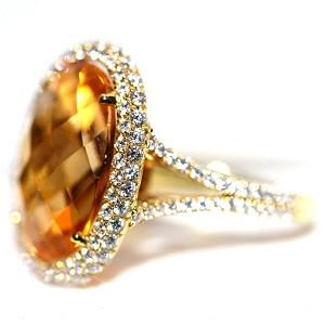 Orange Citrine Ring- Oval Checkered set in 18K Yellow Gold and Diamonds .